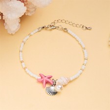 Bracciale classico perle bianche con conchiglia e stelle marine per accessori se