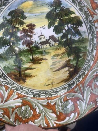 Piatto maiolica dipinto a - in,