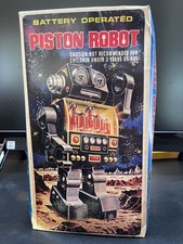 Robot pistone vintage - , a