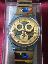 Orologio da polso SWATCH Gent GOLD SMILE (GN123/124)-NUOVO/NOS-Strass/blu-bello!!!