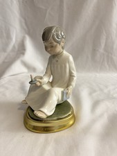 Boy Sitting with Candle + Base - By NAO Llandro - Porcelain Figurine