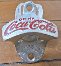 apribottiglie fisso Coca-Cola