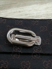 Fermasoldi Gucci tono argento con logo G