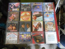 STOK di 32 CD originali Canzoni Latine--Lambada-Mambo-ecc...