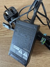 Caricabatteria originale Canon