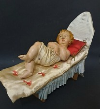 BAMBINELLO IN TERRACOTTA SU