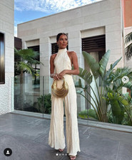 ZARA TOP CON ORLO ASIMMETRICO