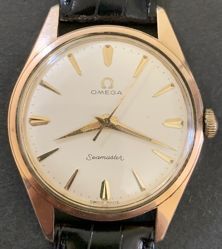 Omega placca oro stile