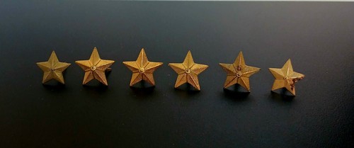 Stellette militari metalliche