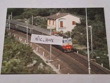 Fotografia Locomotore Elettrico FS E 656.296 in testa ad un convoglio passeggeri