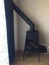 stufa a legna in ghisa usata