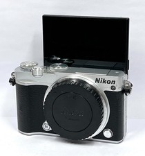 Nikon fotocamera argento - j5,