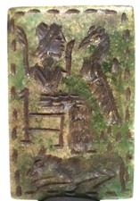 Antico re vicino orientale con pietra animale di giada