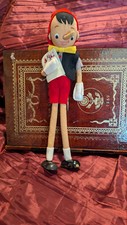 Antico tessuto Pinocchio in ottime condizioni