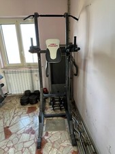Palestra per casa: 200 kg dischi, panche multifunzione, manubri, bilancieri. 
