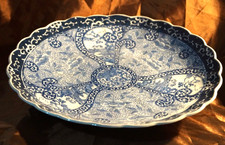 Caricatore porcellana