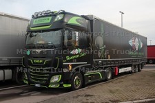 Foto camion DAF XF 480 telone autoarticolato Italia nero trasporto Santi Niini #m1cv