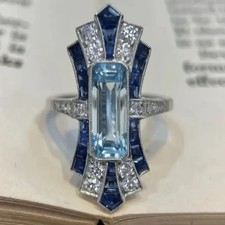 ANELLO EDWARDIAN AGE IN ORO BIANCO 18 KT. TIT. 750 CON ACQUAMARINA E DIAMANTI.