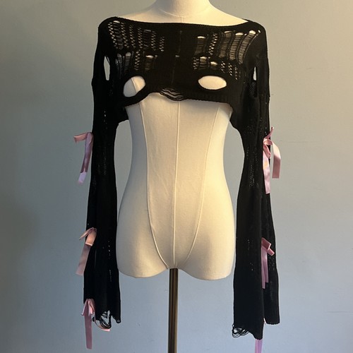 Maglione nero capriccioso