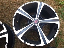 4 cerchi in lega 215/565R16 marca Reds colore nero, inserti argento ottimo stato