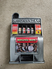 Bonanza Bank Slot Machine Coin Bank stile vintage testato funziona 10"x7"