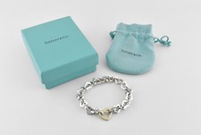 Bracciale Tiffany & Co cuore argento massiccio e oro 18 ct, sacchetto e scatola originali
