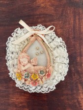 Quadro con un angioletto in rilievo