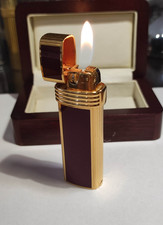 Accendino Christian Dior oro e lacca rossa, revisionato, perfetto