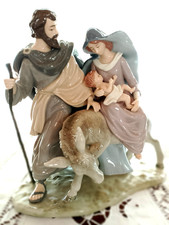 Natività in porcellana " Fuga in Egitto " Alt. cm. 25; Larg. cm. 25  