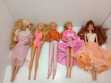 Five Barbie Dolls with Outfits