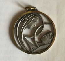  Medaglietta con viso donna uomo