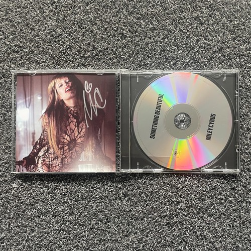 Miley cyrus something - miley,