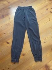 Pantaloni neri harem alla