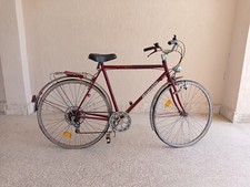 bicicletta bianchi usata colore rosso, ruota posteriore da riparare come da foto