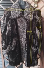 Pelliccia castoro marrone con intarsi di astrakan, con segni di usura