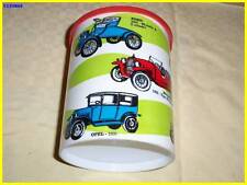 Barattolo per alimenti usato, con riproduzione macchine di varie epoche dal 1905