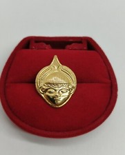 Spilla maschera in oro giallo 18k 750