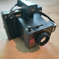 Polaroid macchina - @,