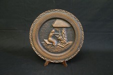 Copper plate bas-relief hand