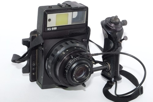 Macchina fotografica - , a
