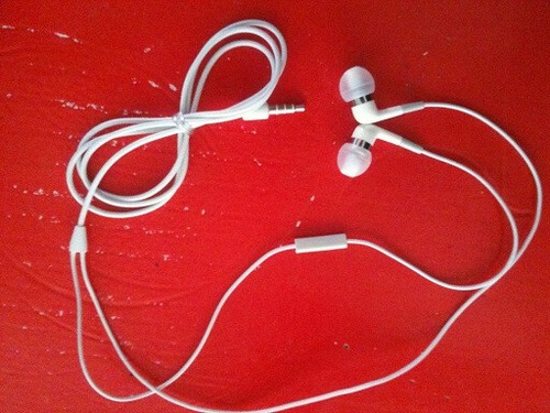 Auricolari bianchi con - auricolari,