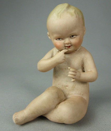 Figurina bambino seduto - figurina,