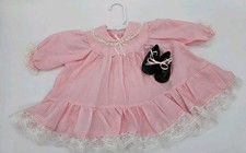 Vestito bambola rosa per testa