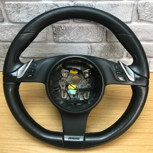 Volante pelle nera - in,