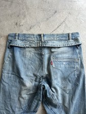 Fibbia jeans intrecciata