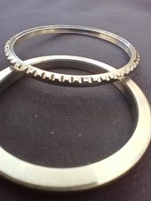 Rolex Sea Dweller Ref. 1665 ghiera e stringivetro nuovo "NOS"