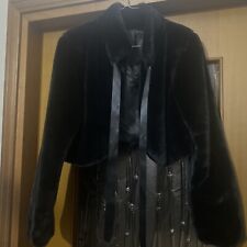 Copri spalle in eco pelliccia chiusura a fiocco