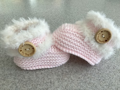 Hand made knitted baby girl - hand,