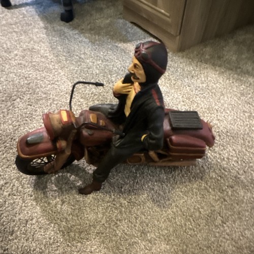 Scultura statuina motociclista