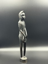 Statua suonatore di flauto
